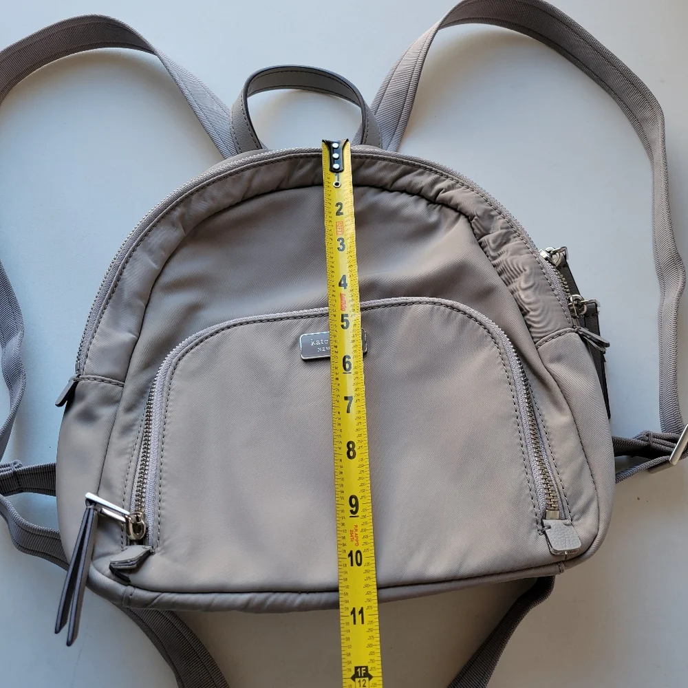 Kate Spade Dawn medium size backpack in light gray